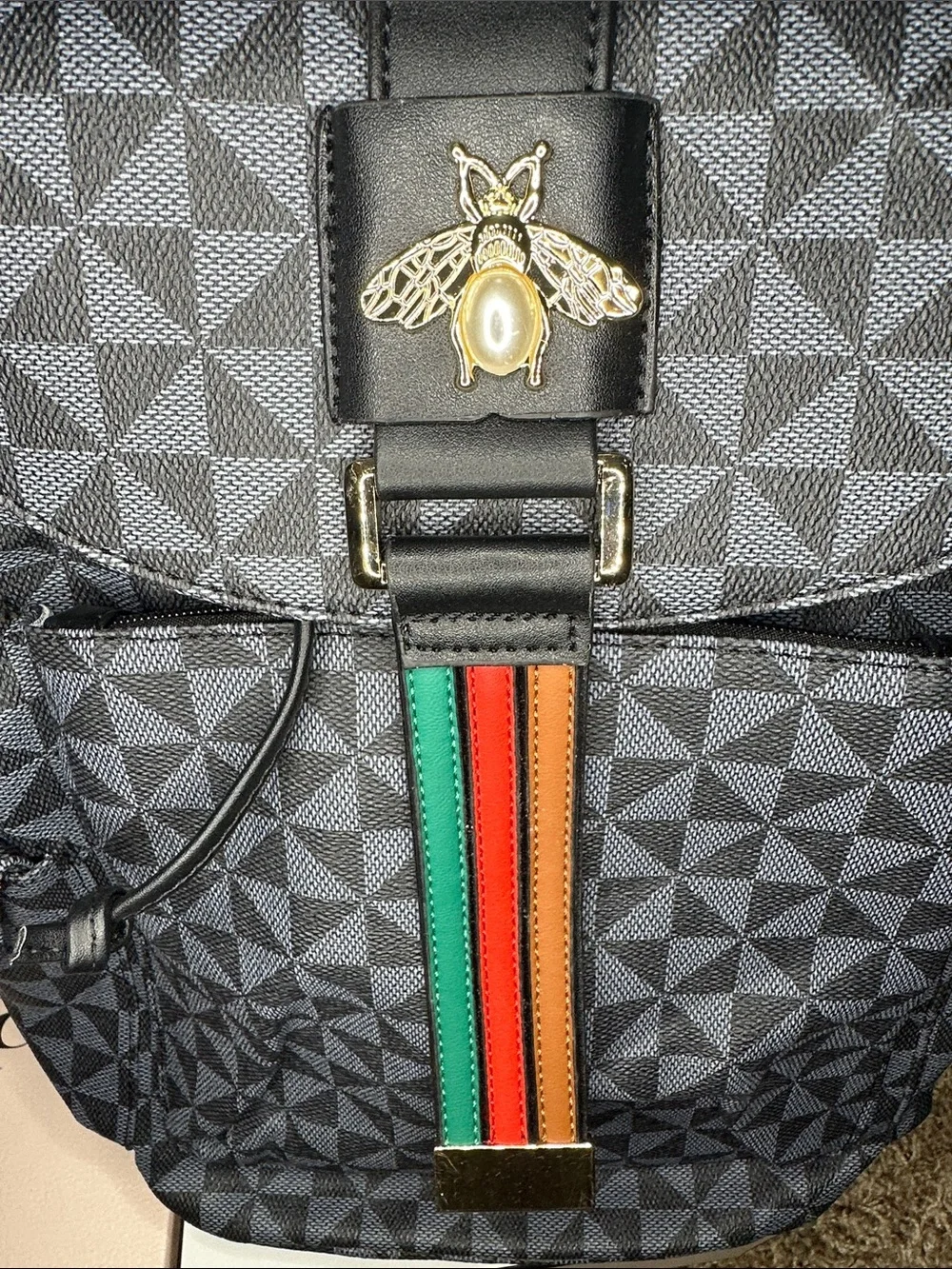 Men's Black Geometric Backpack with Bee Accent and Multicolor Stripe -